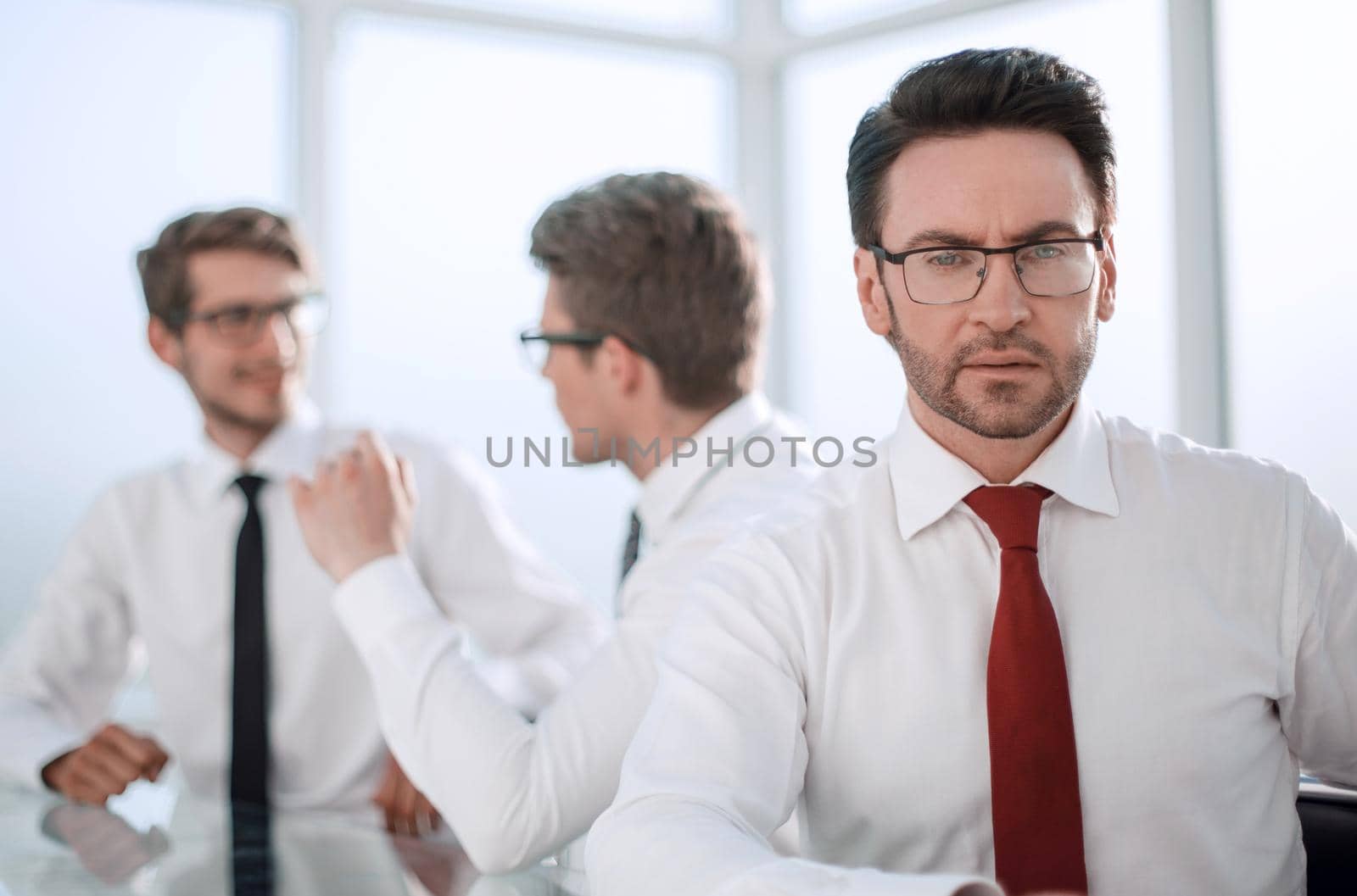 businessman on the background of the office by asdf