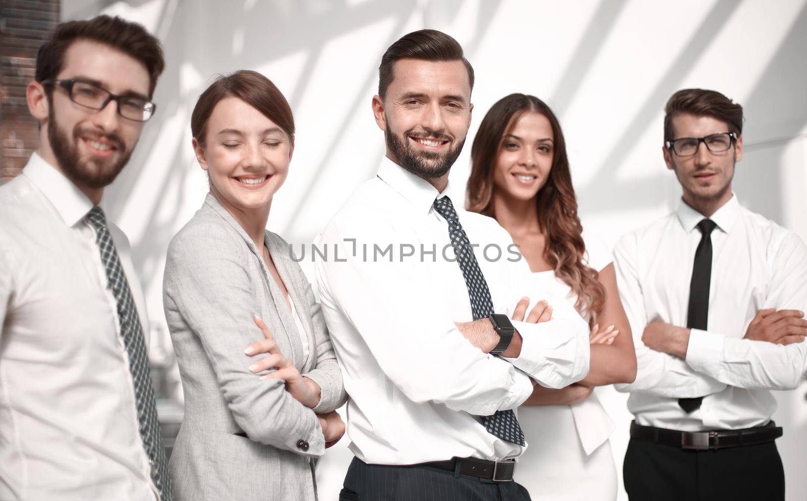 close up.professional business team standing in the office.the concept of teamwork