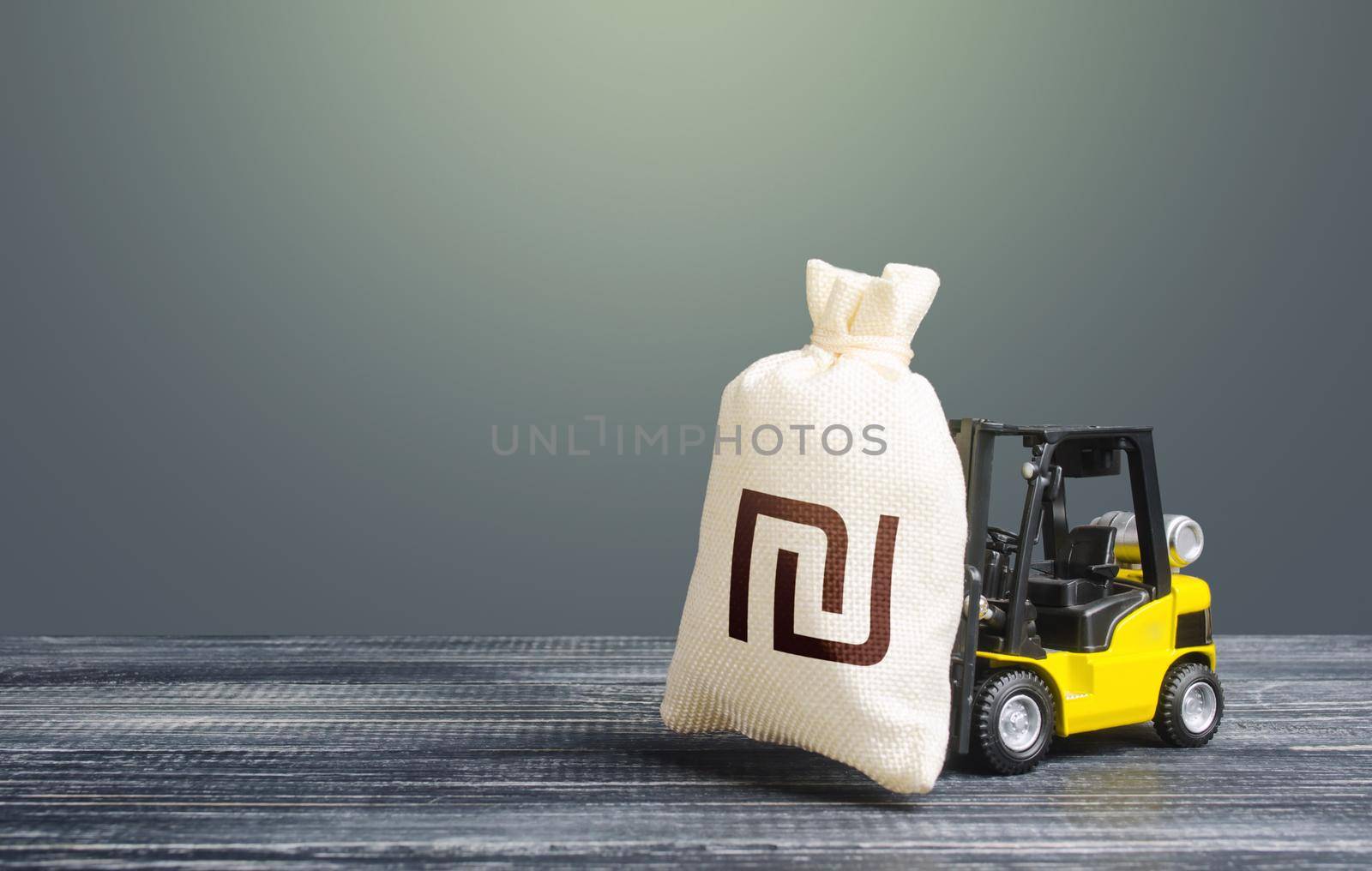 Forklift transports a israeli shekel money bag. Attraction of investments in business and economy, cheap loans, leasing. Crisis recovery measures. Borrowing on capital market. Stimulating economy. by iLixe48