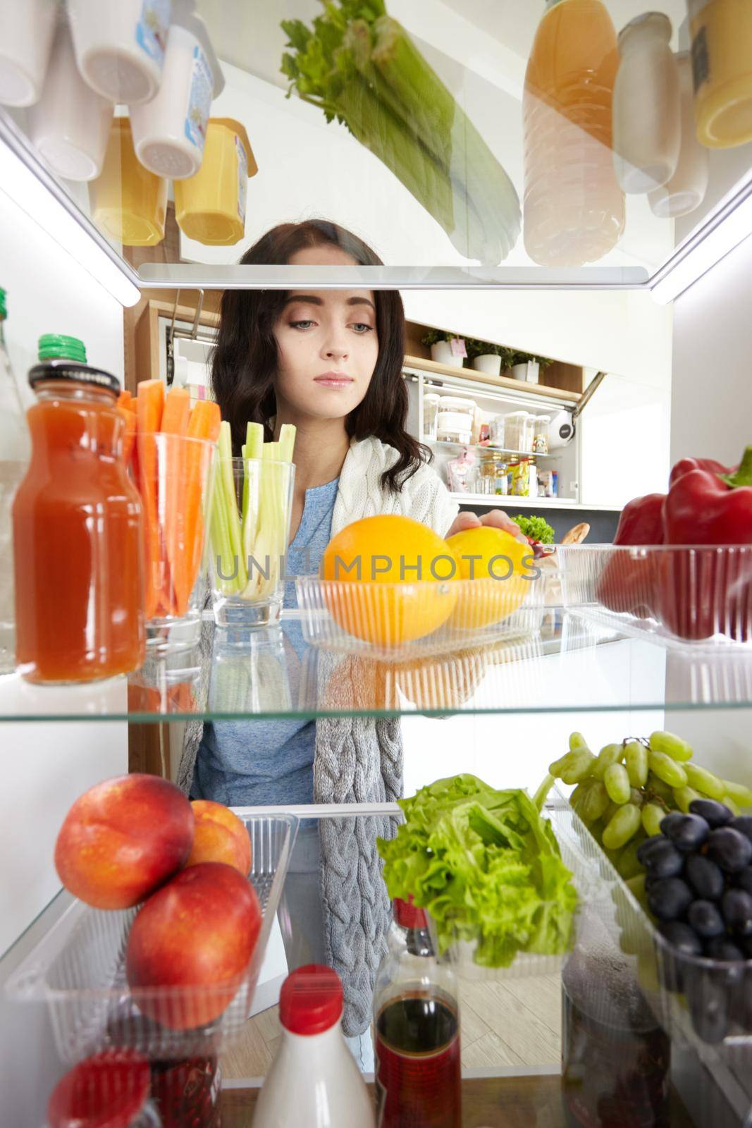 Open refrigerator with fresh fruits and vegetable. Open refrigerator.