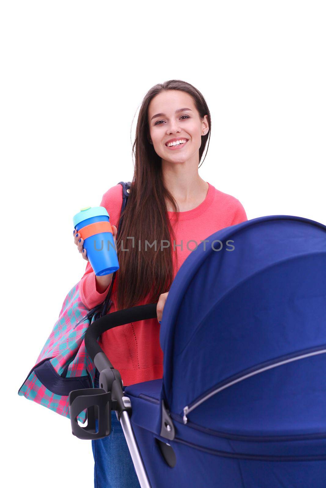 Full length portrait of a mother with a stroller, isolated on white background. Young mom.