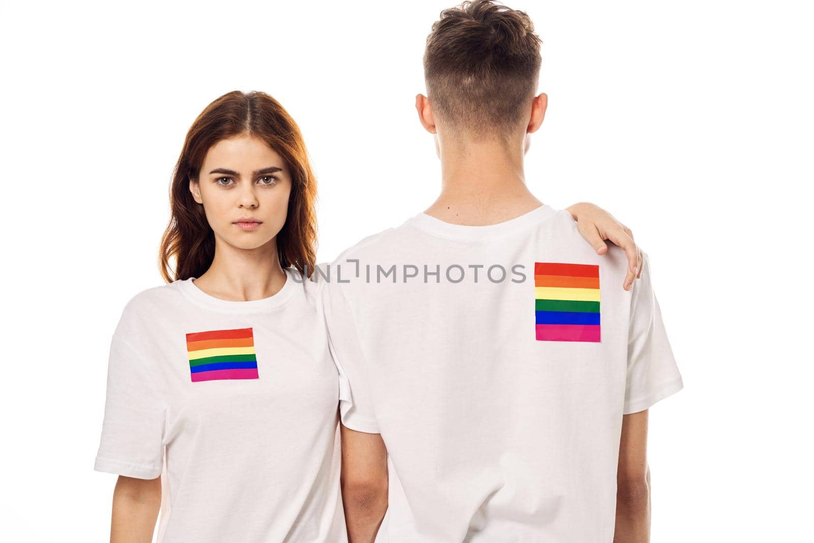 young couple lgbt Flag transgender lifestyle light background. High quality photo