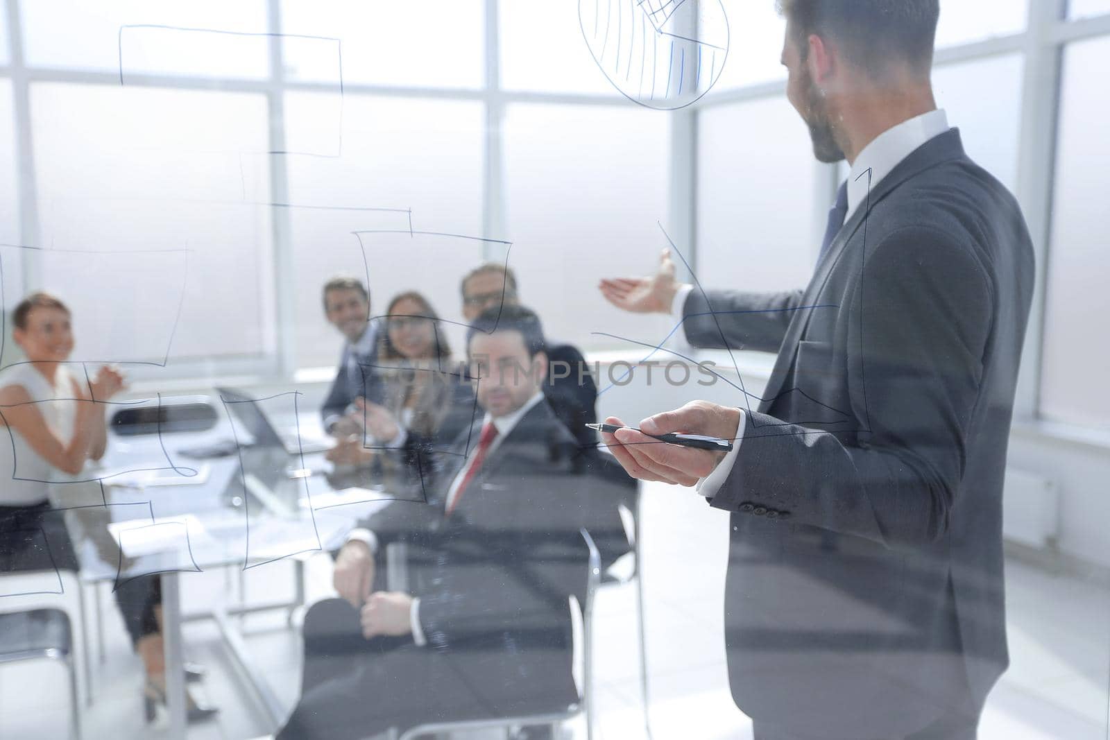 businessman makes a presentation of a new project in a modern office.business concept