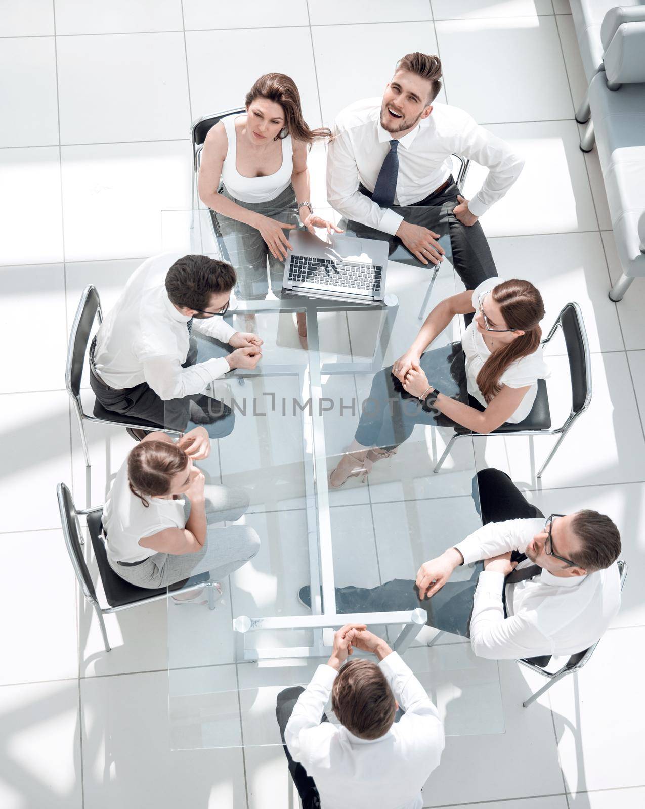 top view.business team sitting at the office table.the concept of teamwork