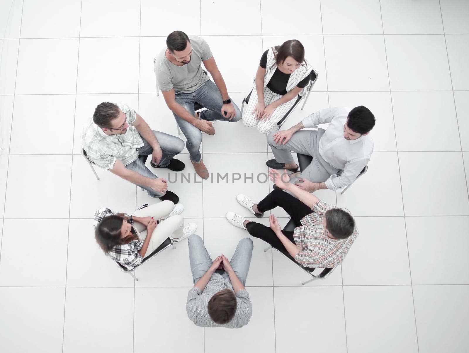 top view.business team discussing current issues.the concept of teamwork