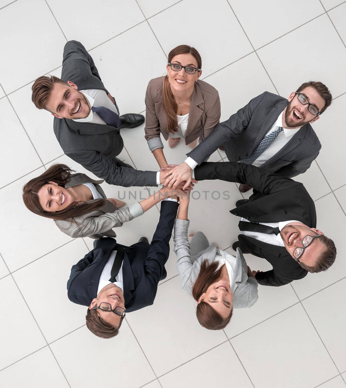 top view.business team standing in a circle by asdf