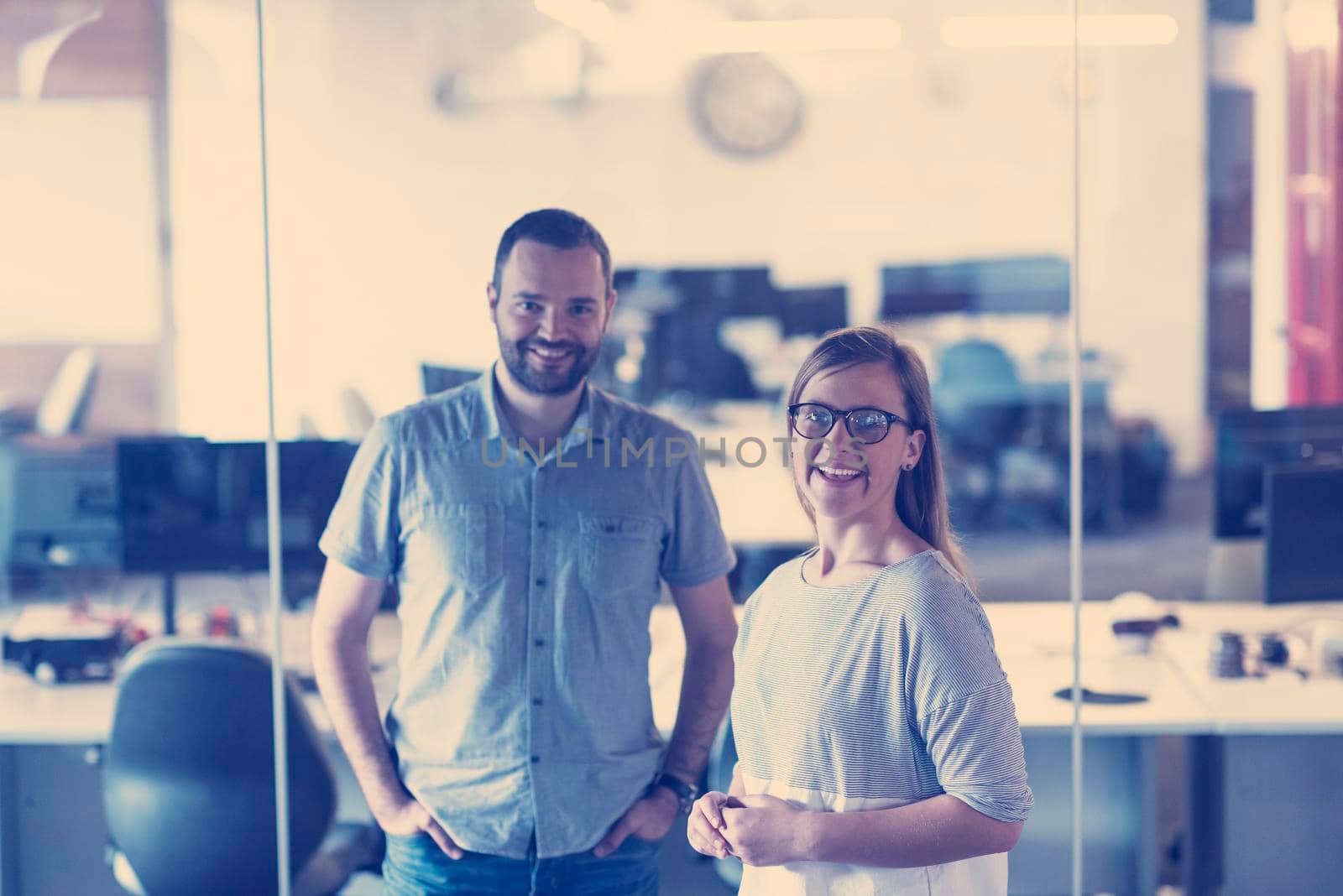 business couple working together on project at modern startup office