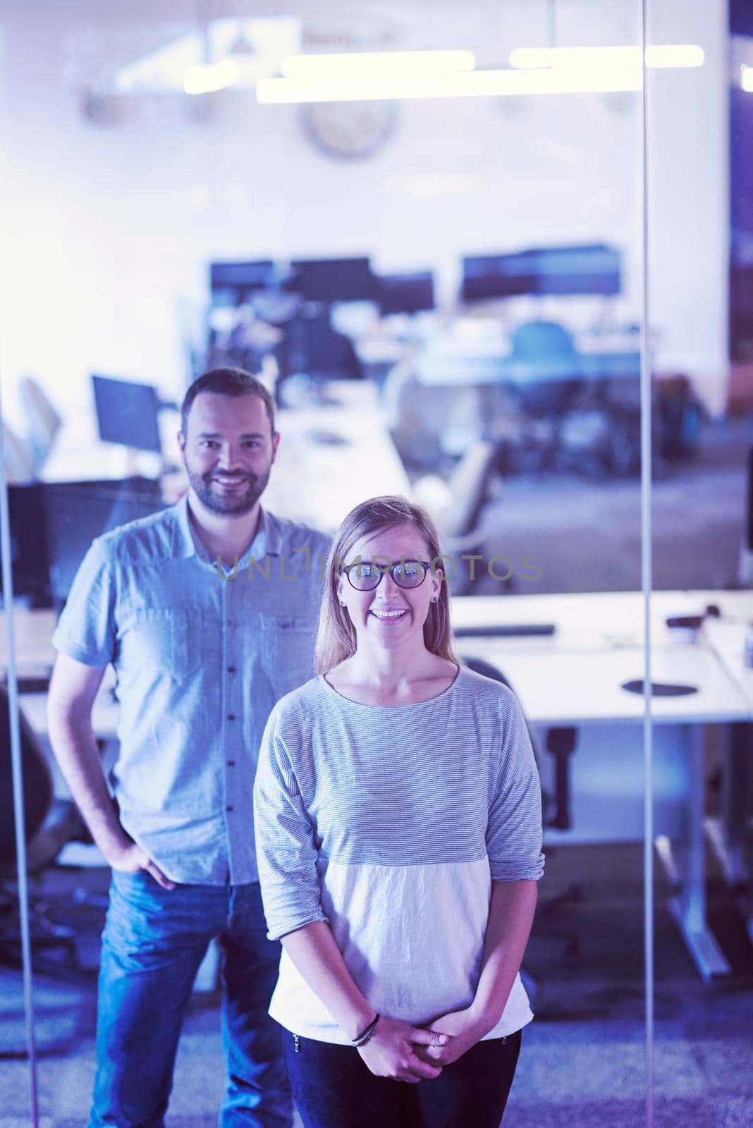 business couple working together on project at modern startup office