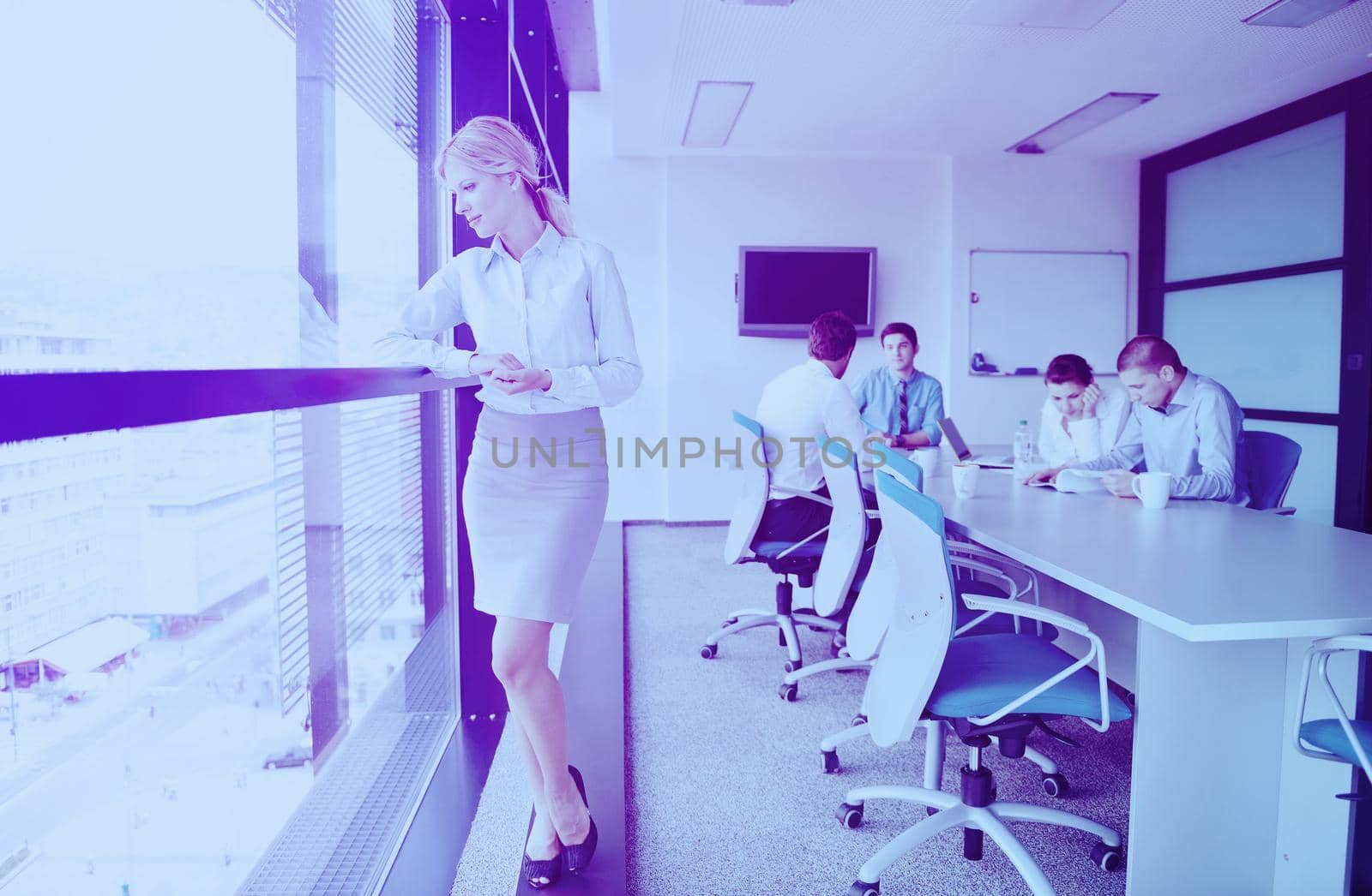 business woman  with her staff,  people group in background at modern bright office indoors