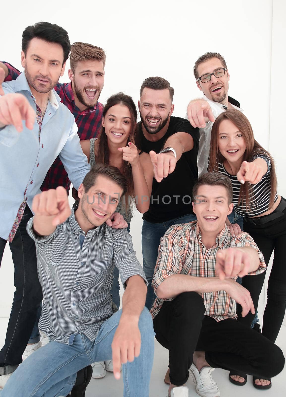 group of successful young men pointing at you by asdf