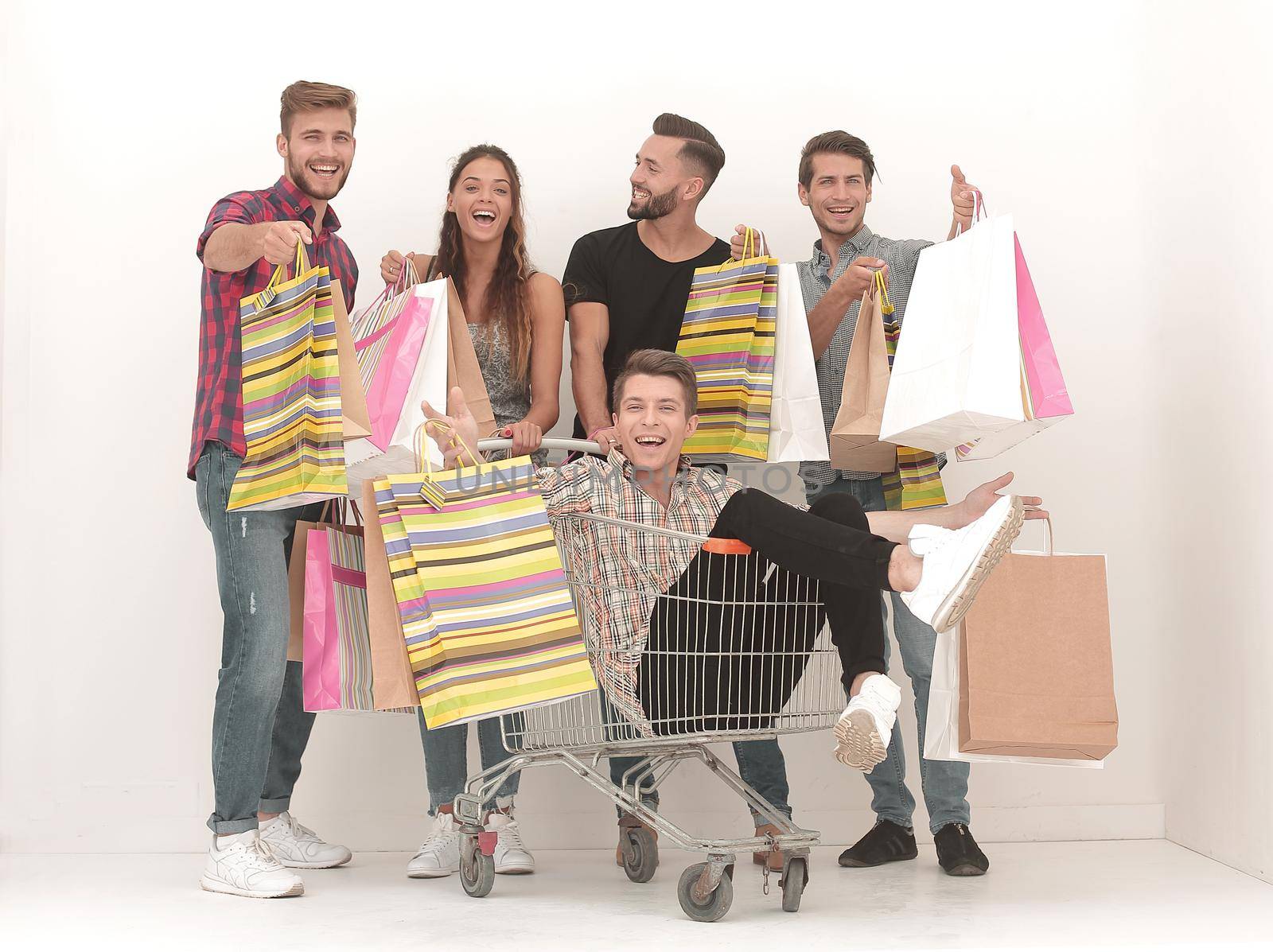 happy group of friends with shopping bags.photo with copy space