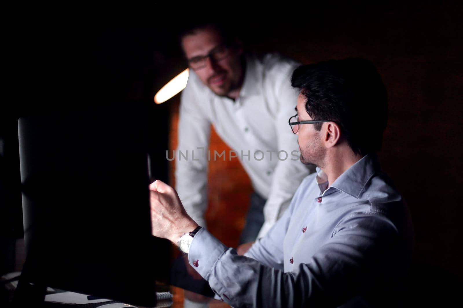 businessman working with documents dark office by asdf
