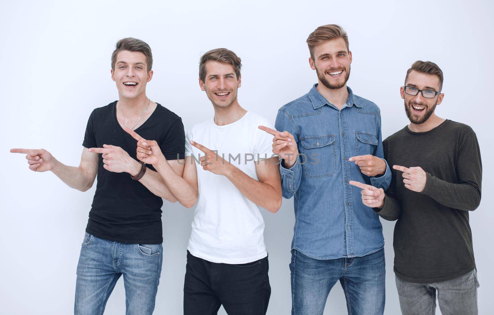 group of young people pointing at something.isolated on white background