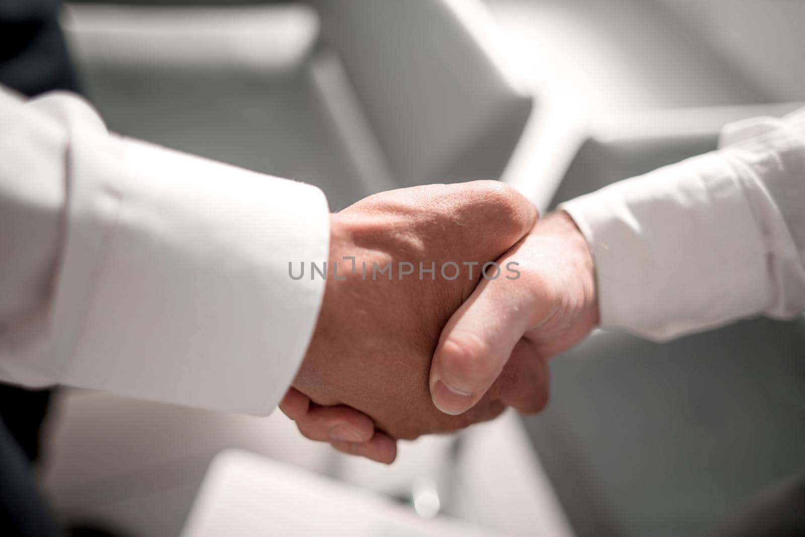 close up.reliable handshake of business partners .the concept of cooperation