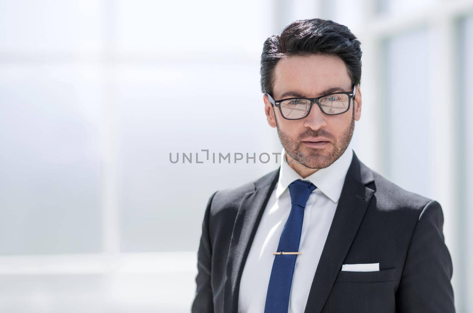 beautiful businessman in the office background.business people