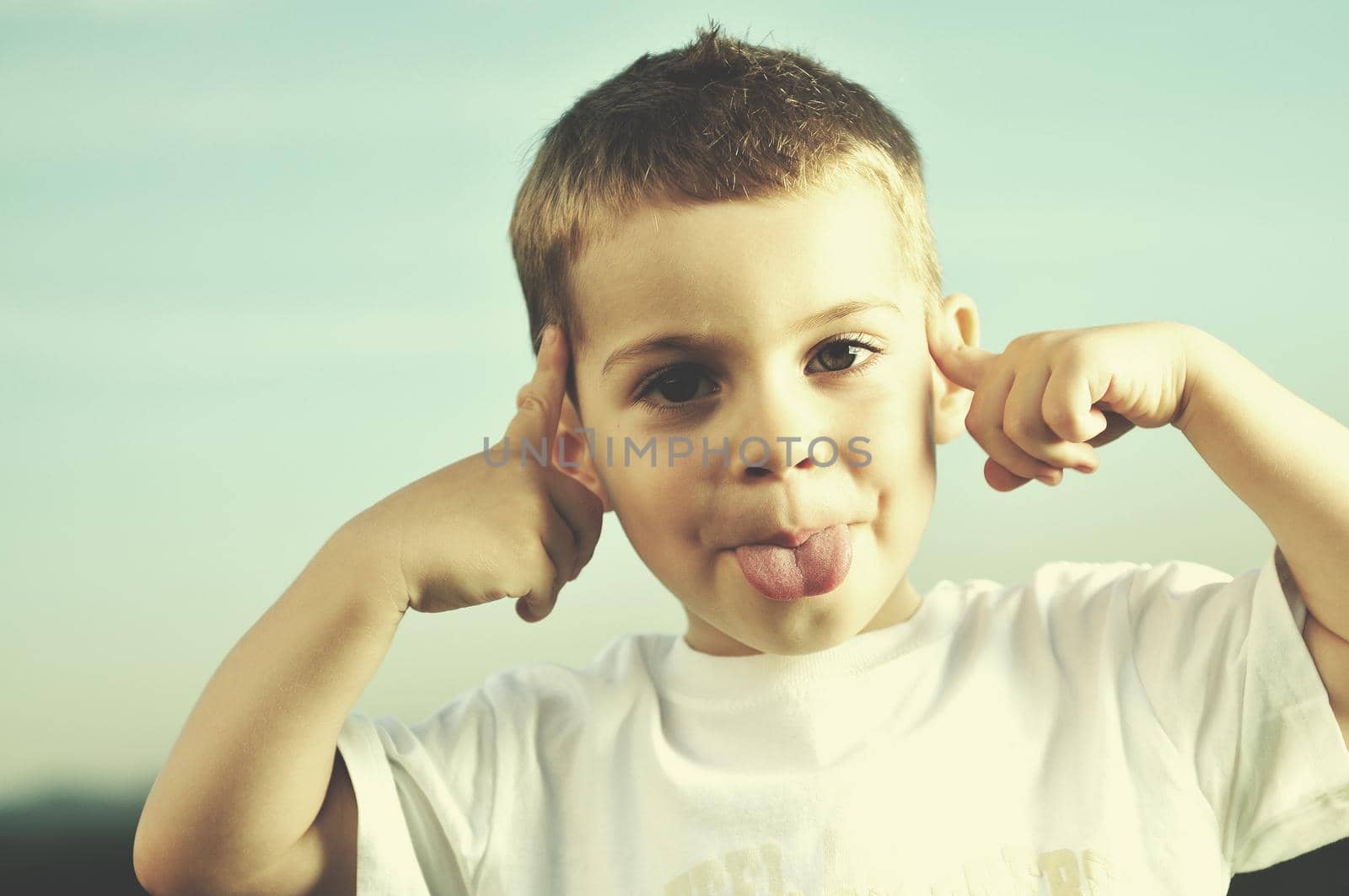 happy young boy child outdoor portrait