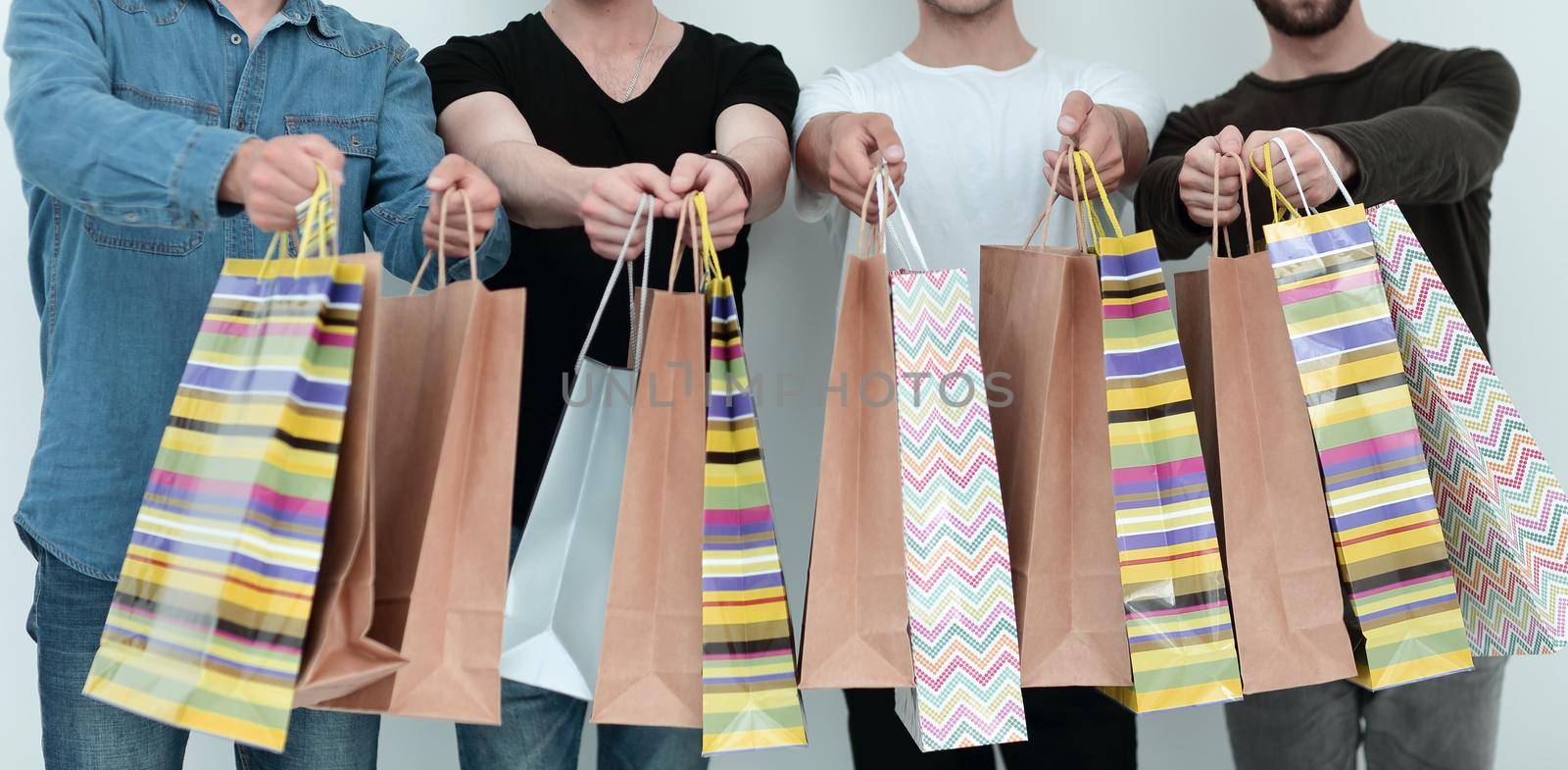 close up.group of students with shopping bags .shopping and lifestyle