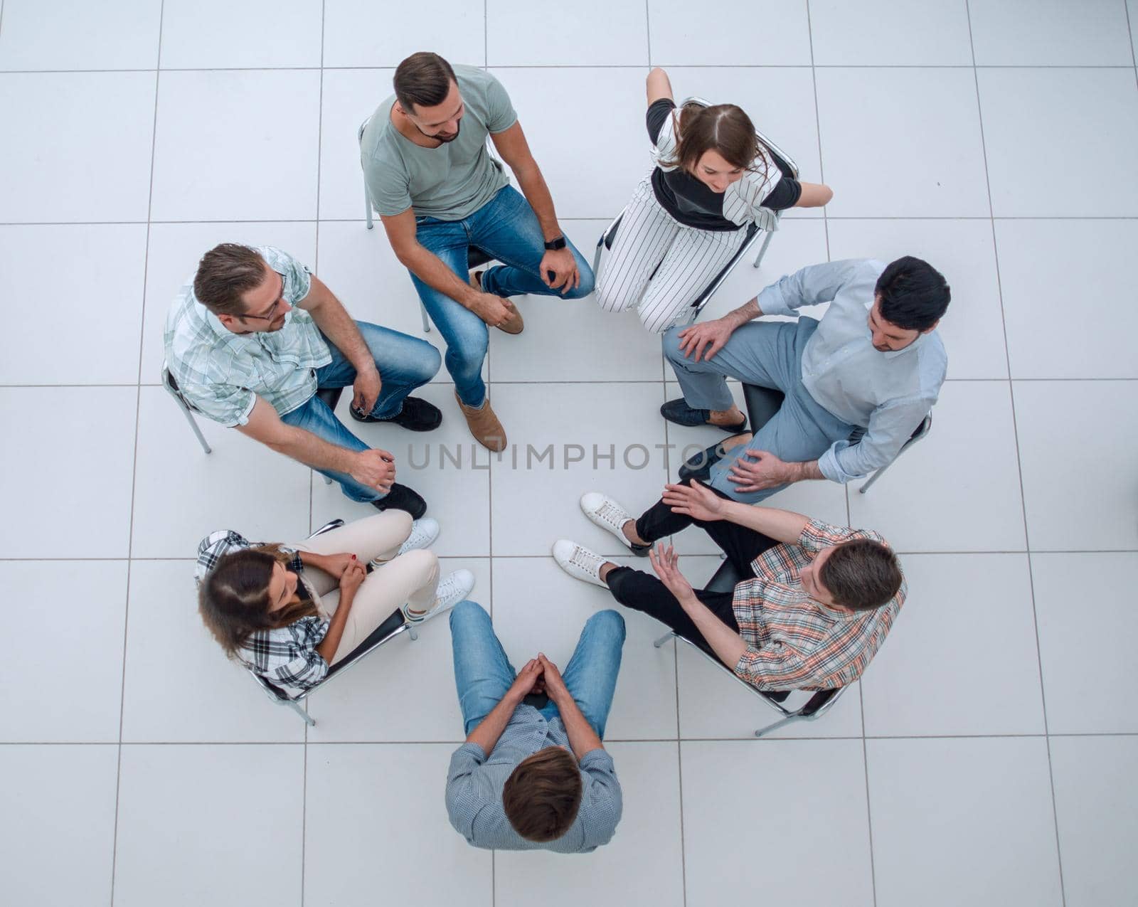 top view.business team discussing current issues.the concept of teamwork