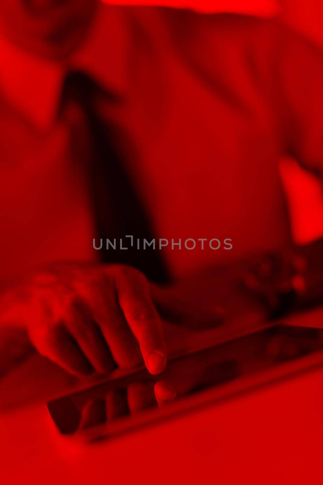 close-up of human hand  business man using tablet compuer at office