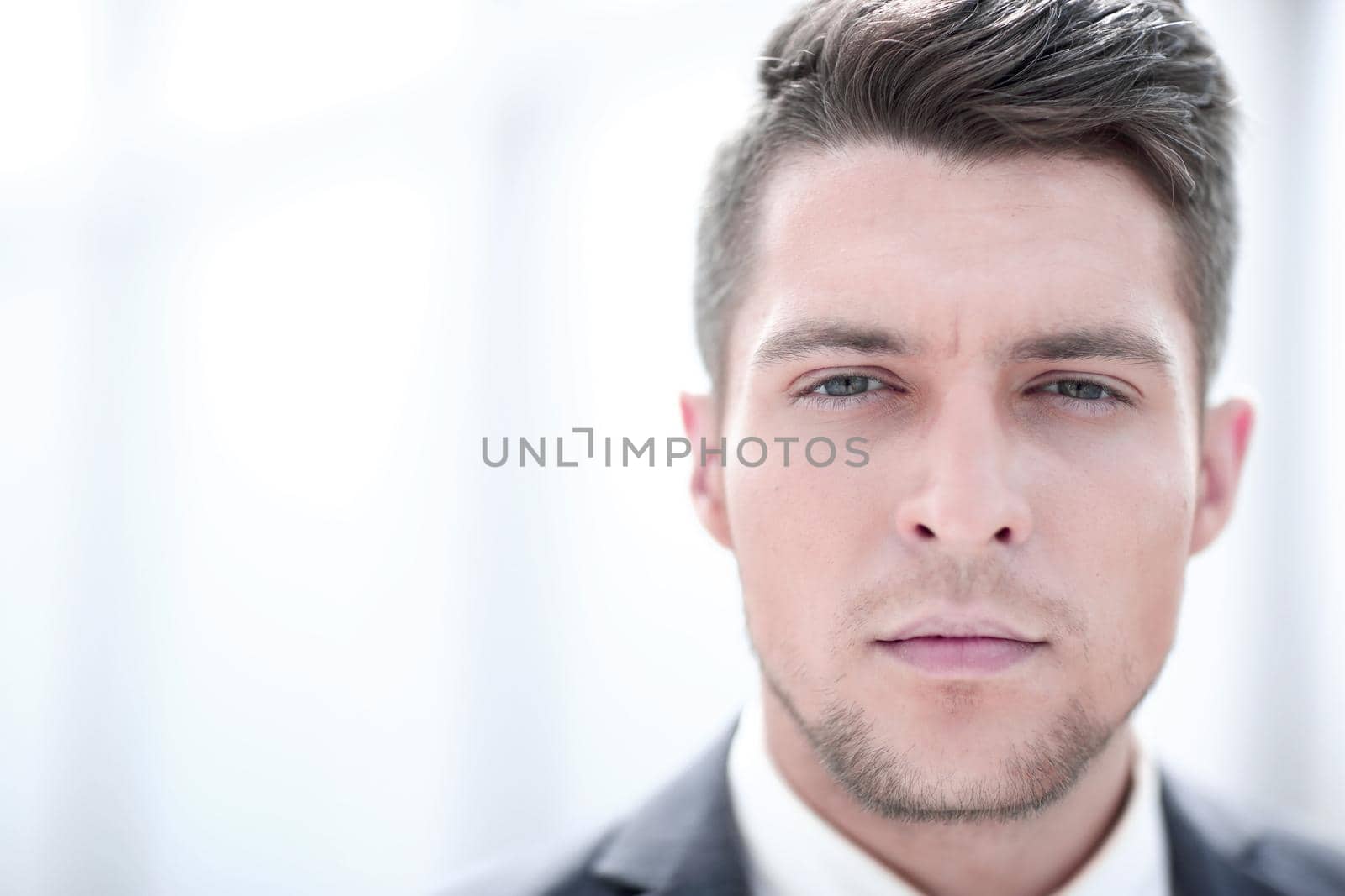 Close up portrait of serious businessman by asdf