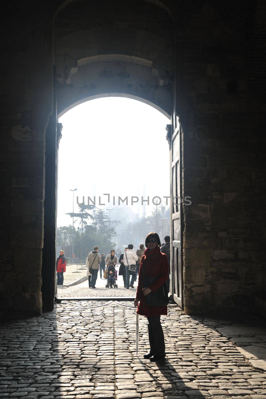 happy young tourist woman travel visit ancient istambul in turkey and old ayasofya blue mosque