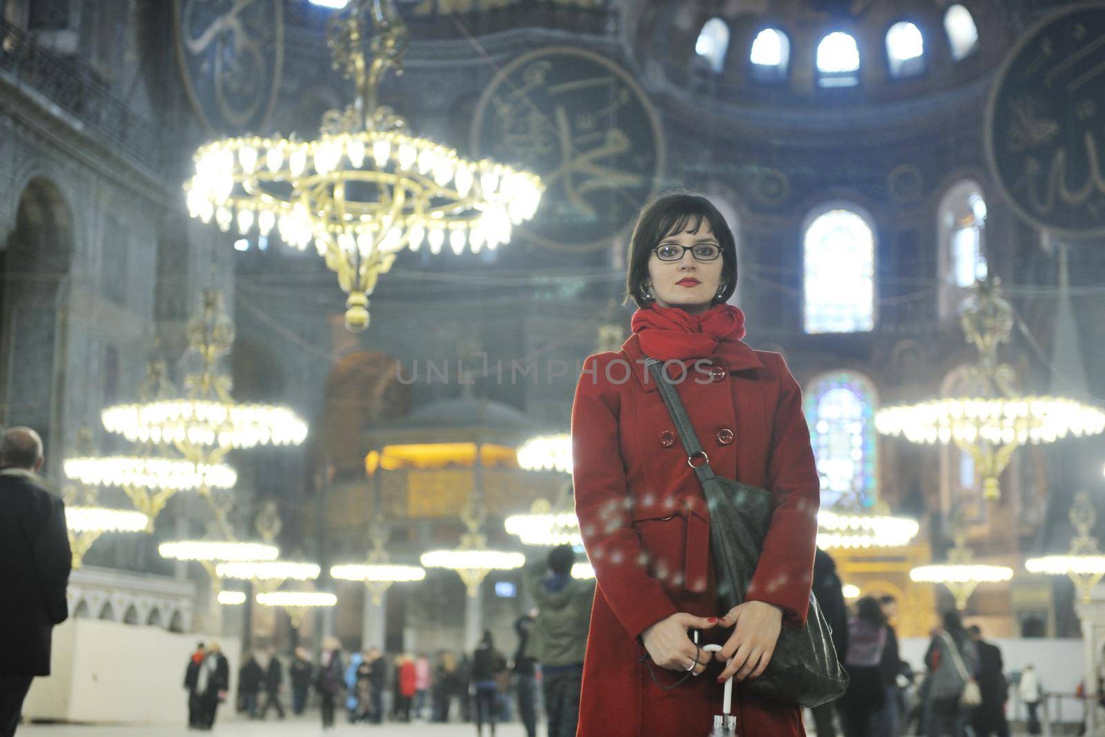 happy young tourist woman travel visit ancient istambul in turkey and old ayasofya blue mosque