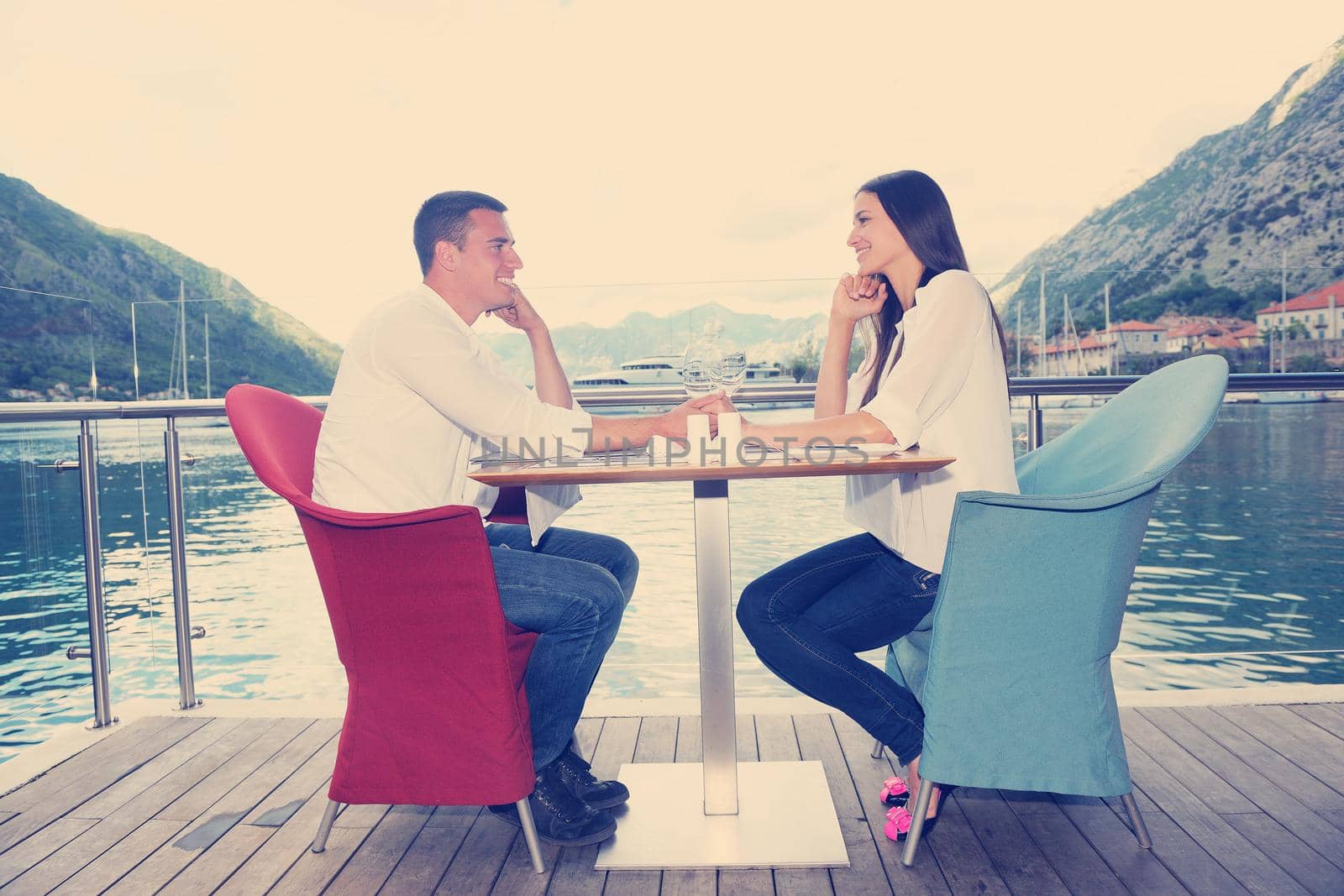 couple having lanch at beautiful restaurant by dotshock