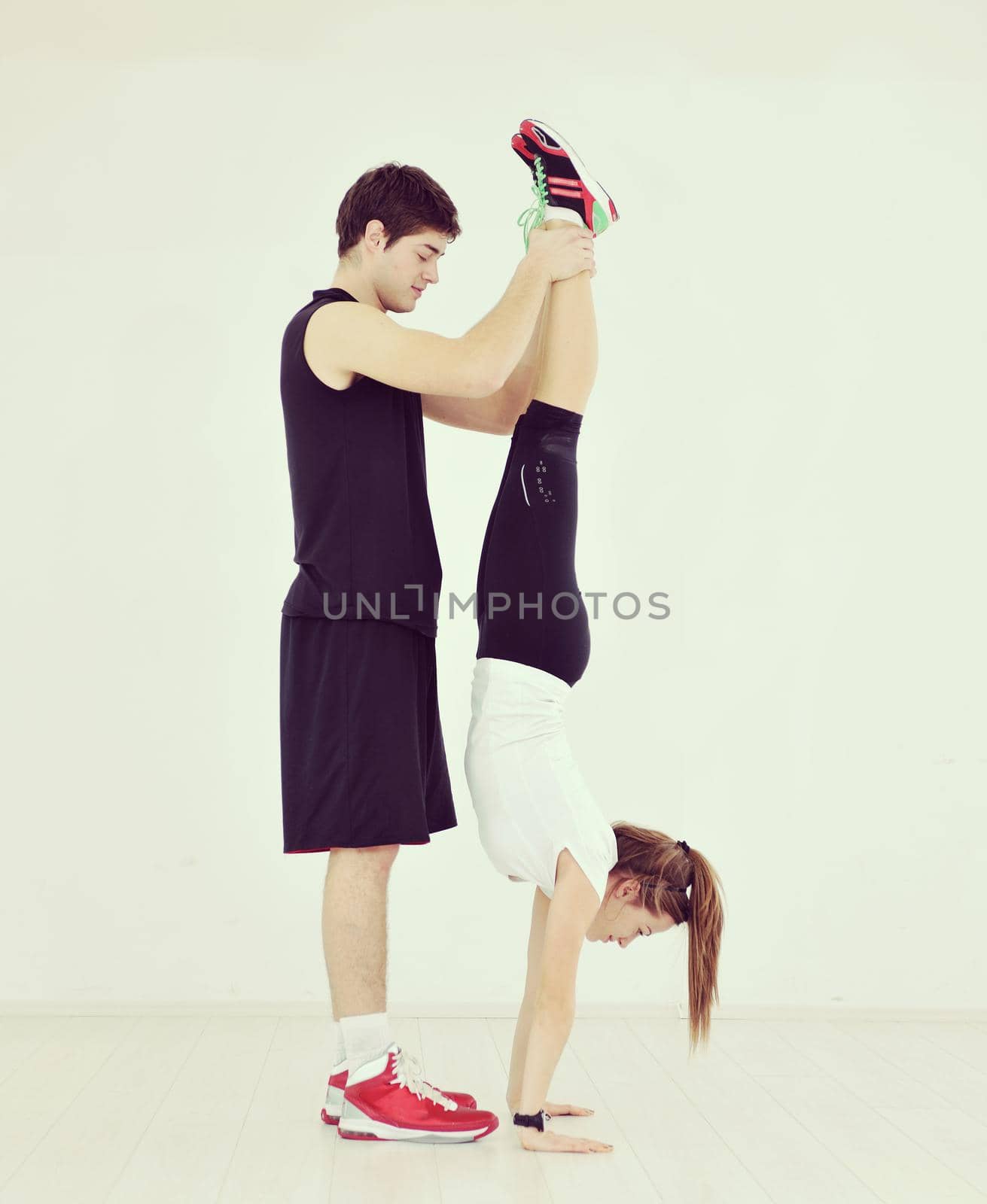 young people group in fitness club by dotshock