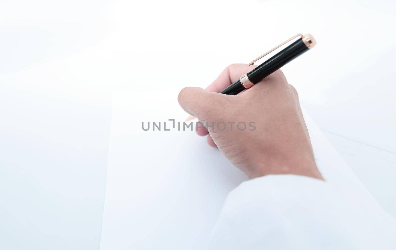 close up.the scientist makes a record on a blank sheet.photo with copy space
