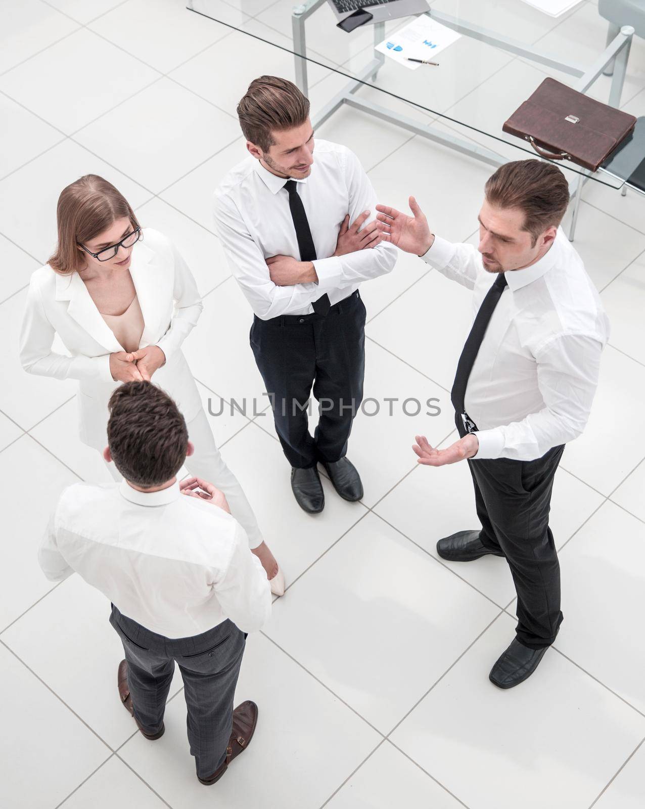 top view.employees of the company discussing new ideas.photo with copy space