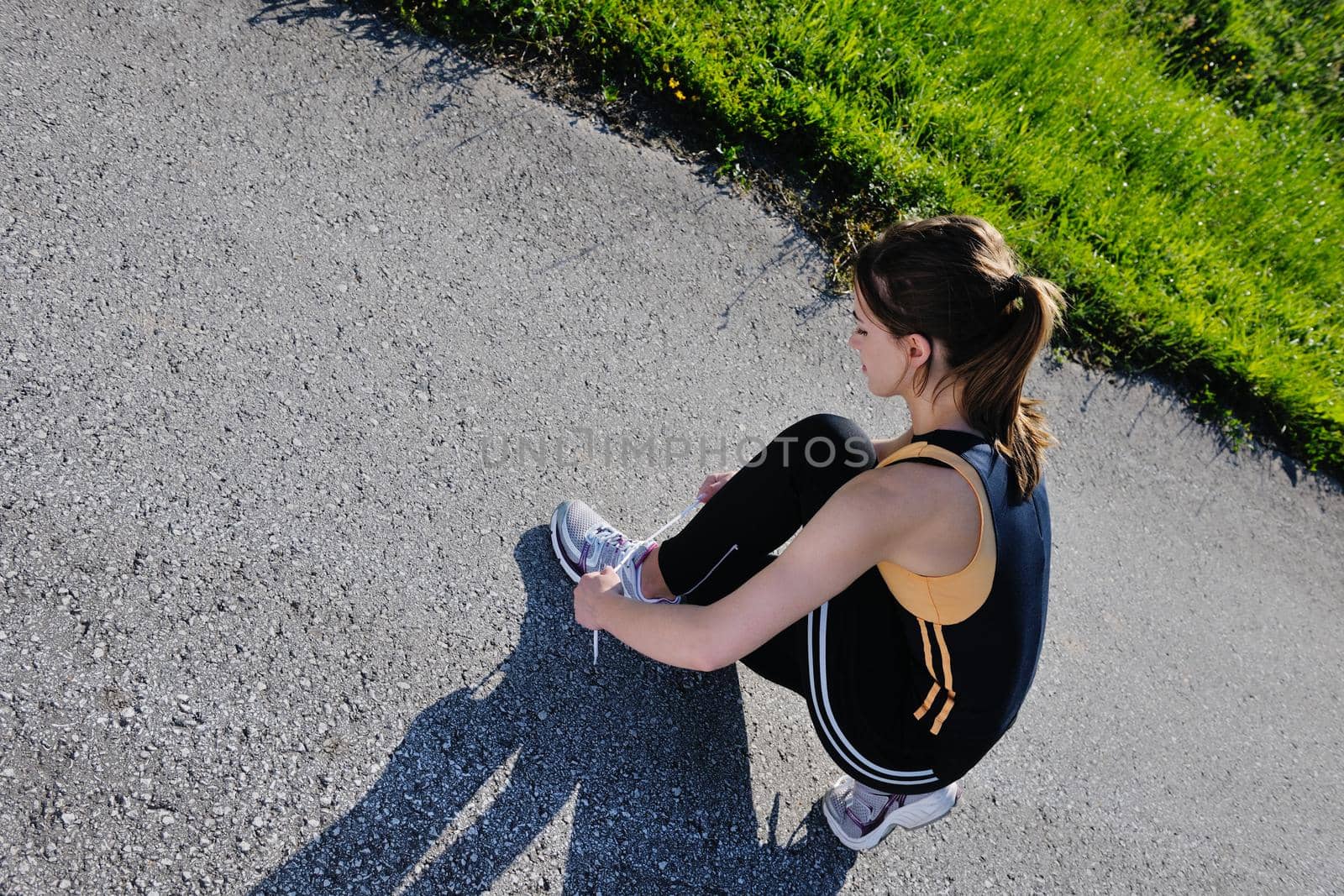 Young beautiful  woman jogging by dotshock