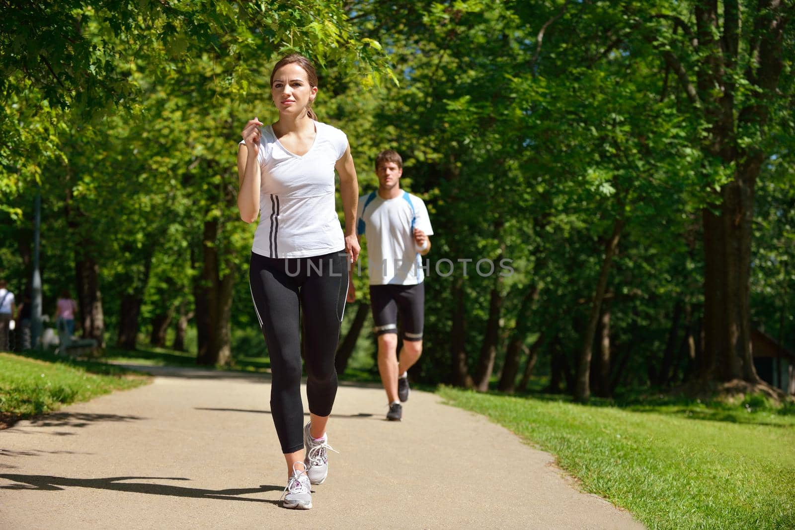Young couple jogging at morning by dotshock