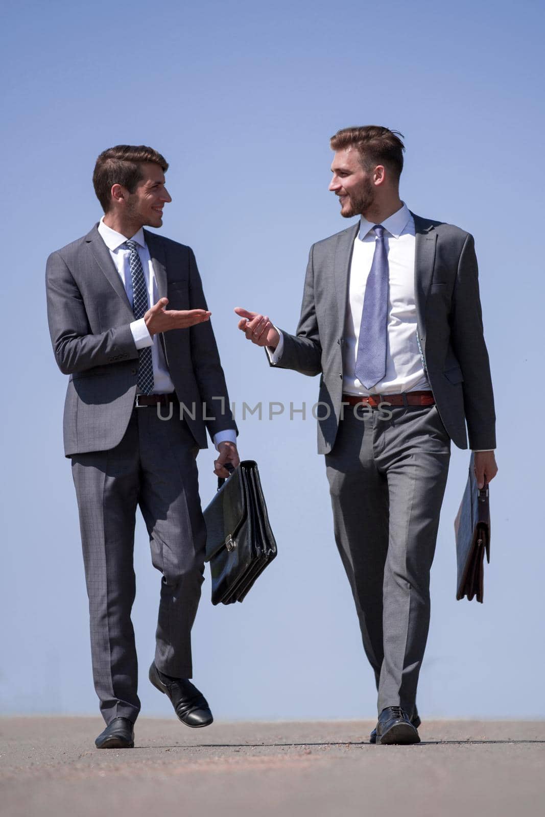 business people discuss something on the street .photo with copy space
