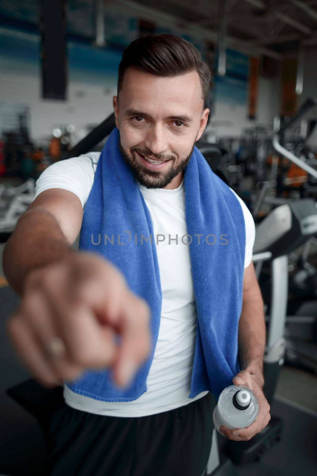 close up.confident sports man pointing at you by asdf