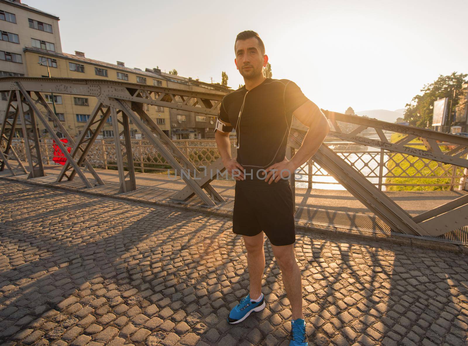 portrait of a jogging man at sunny morning by dotshock