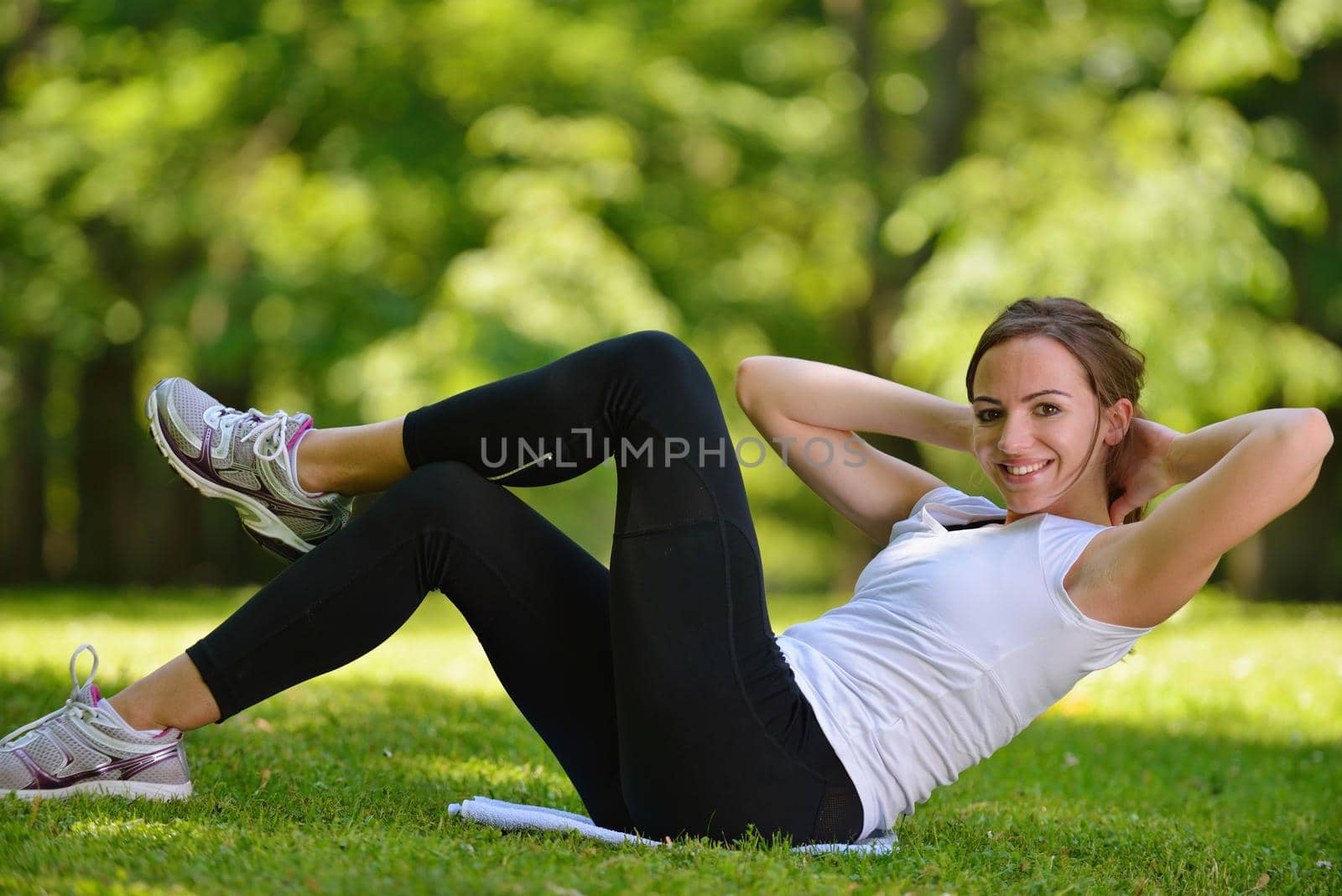 Young couple jogging in park at morning. Health and fitness.