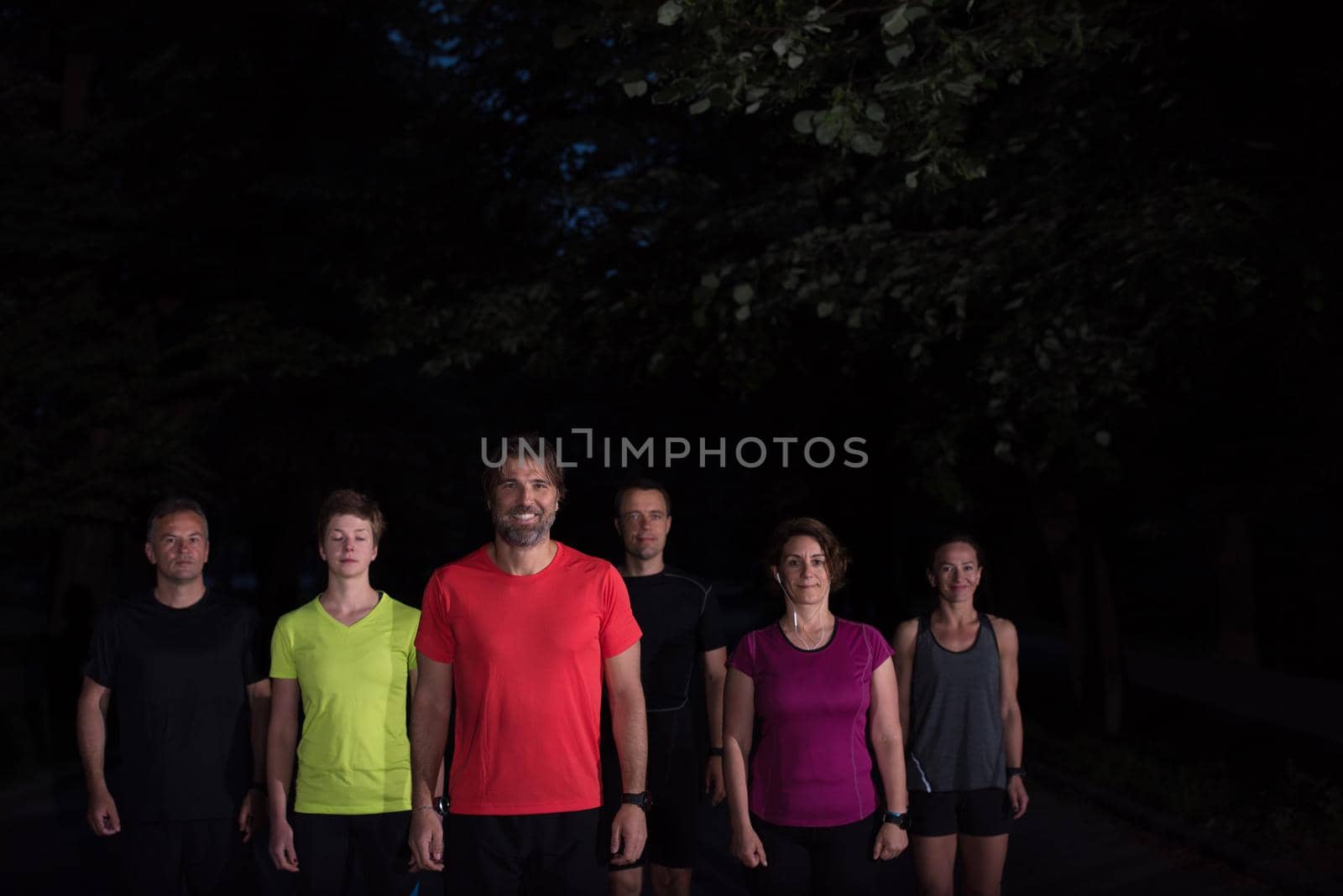 runners team on the night training by dotshock