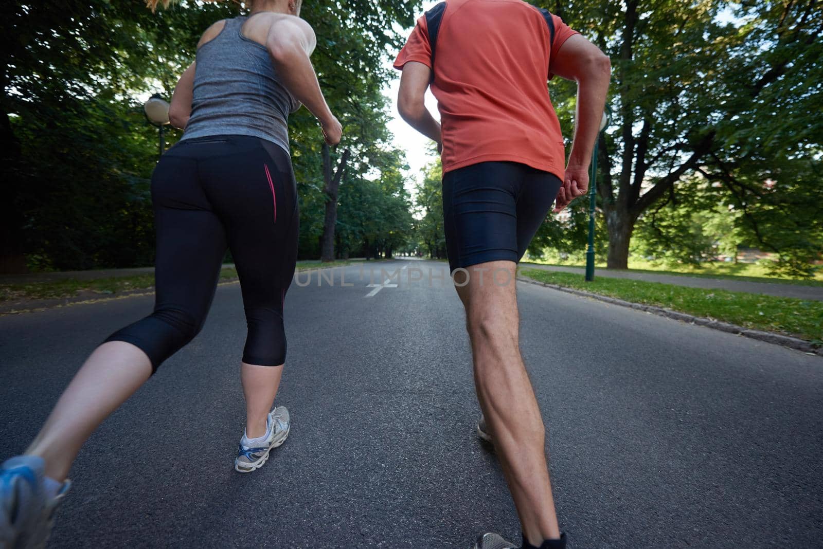 couple jogging by dotshock