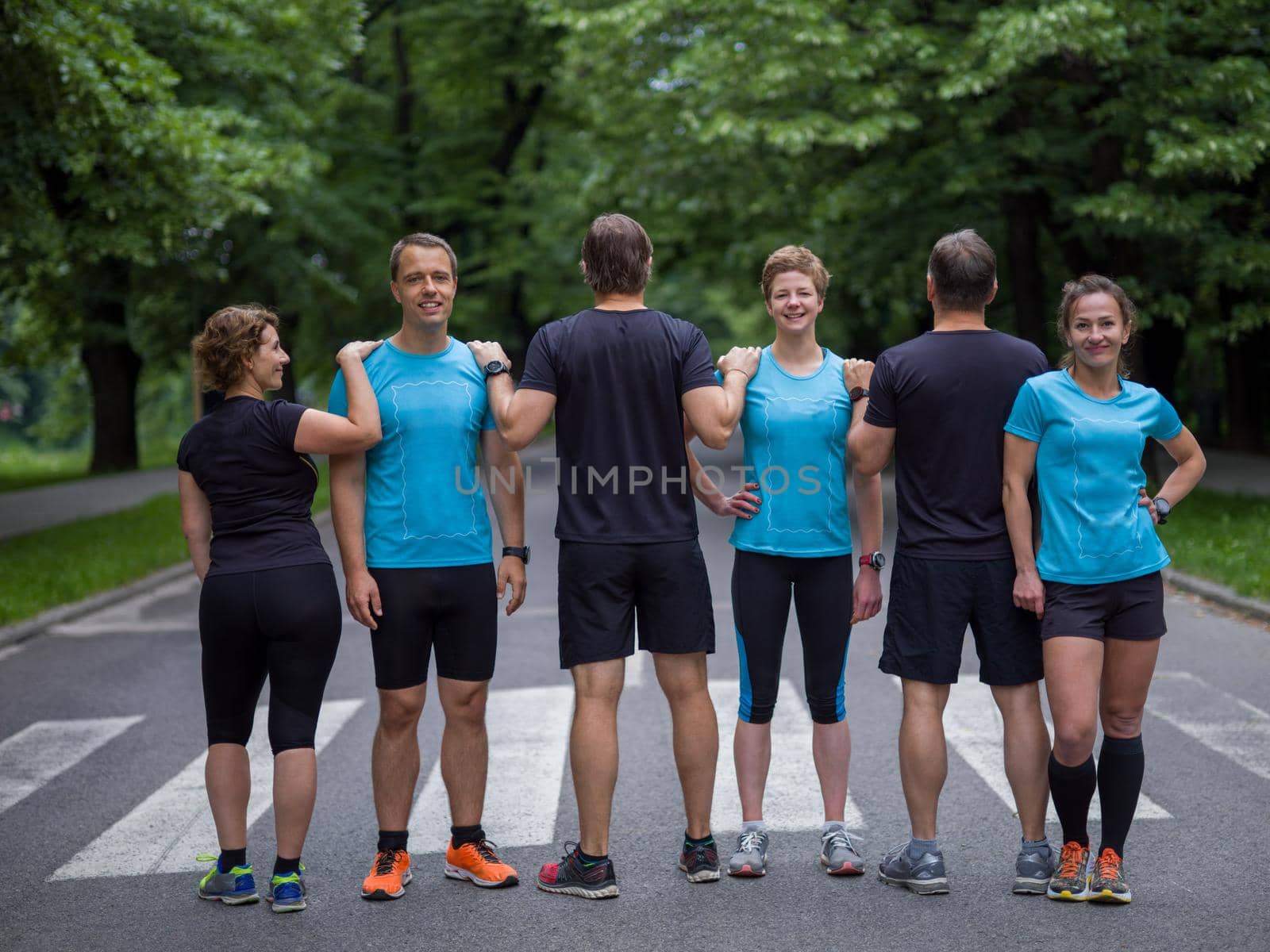 portrait of runners team on morning training by dotshock