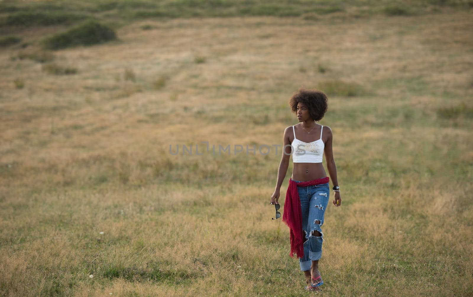 young black woman in nature by dotshock