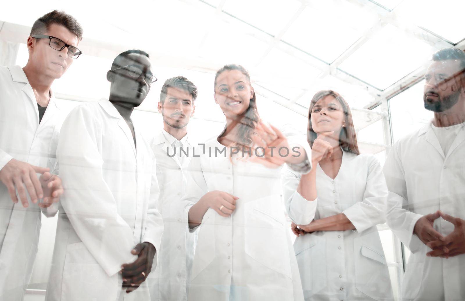 closeup of a doctor-pharmacists and colleagues working in the laboratory. by asdf