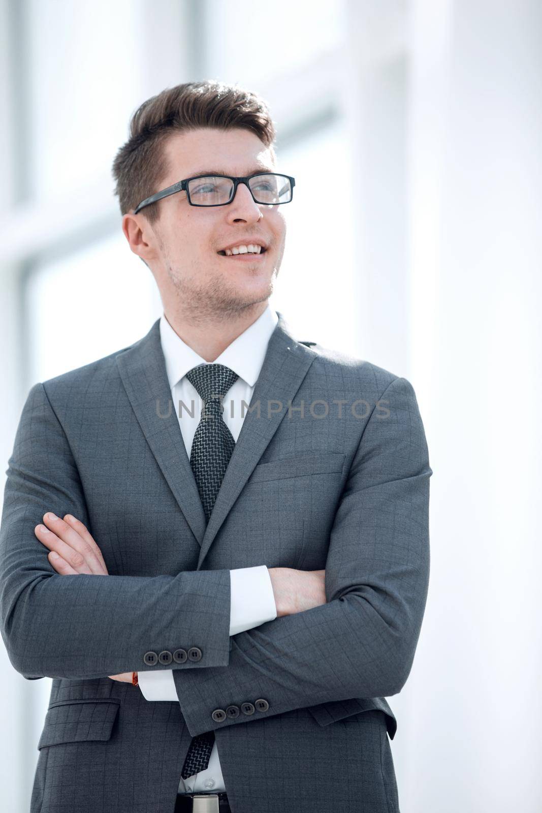 portrait of a modern young businessman. by asdf