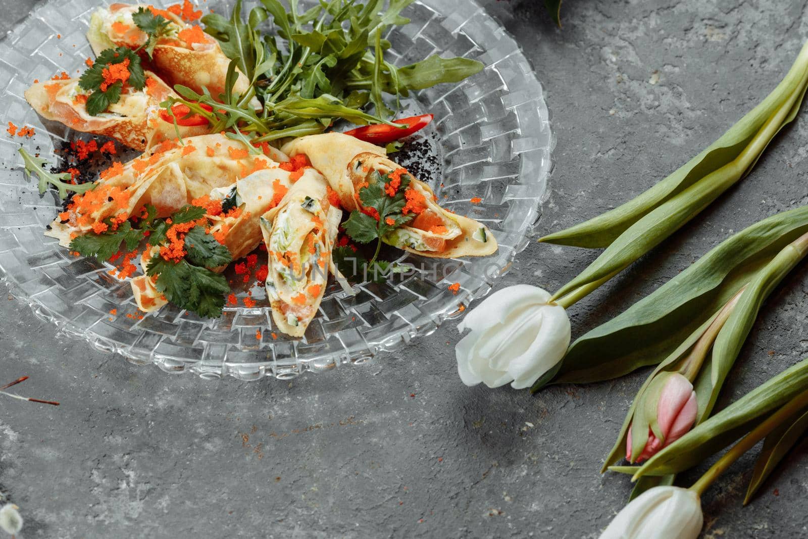 thin pancakes with caviar and salmon, rolled into rolls by UcheaD