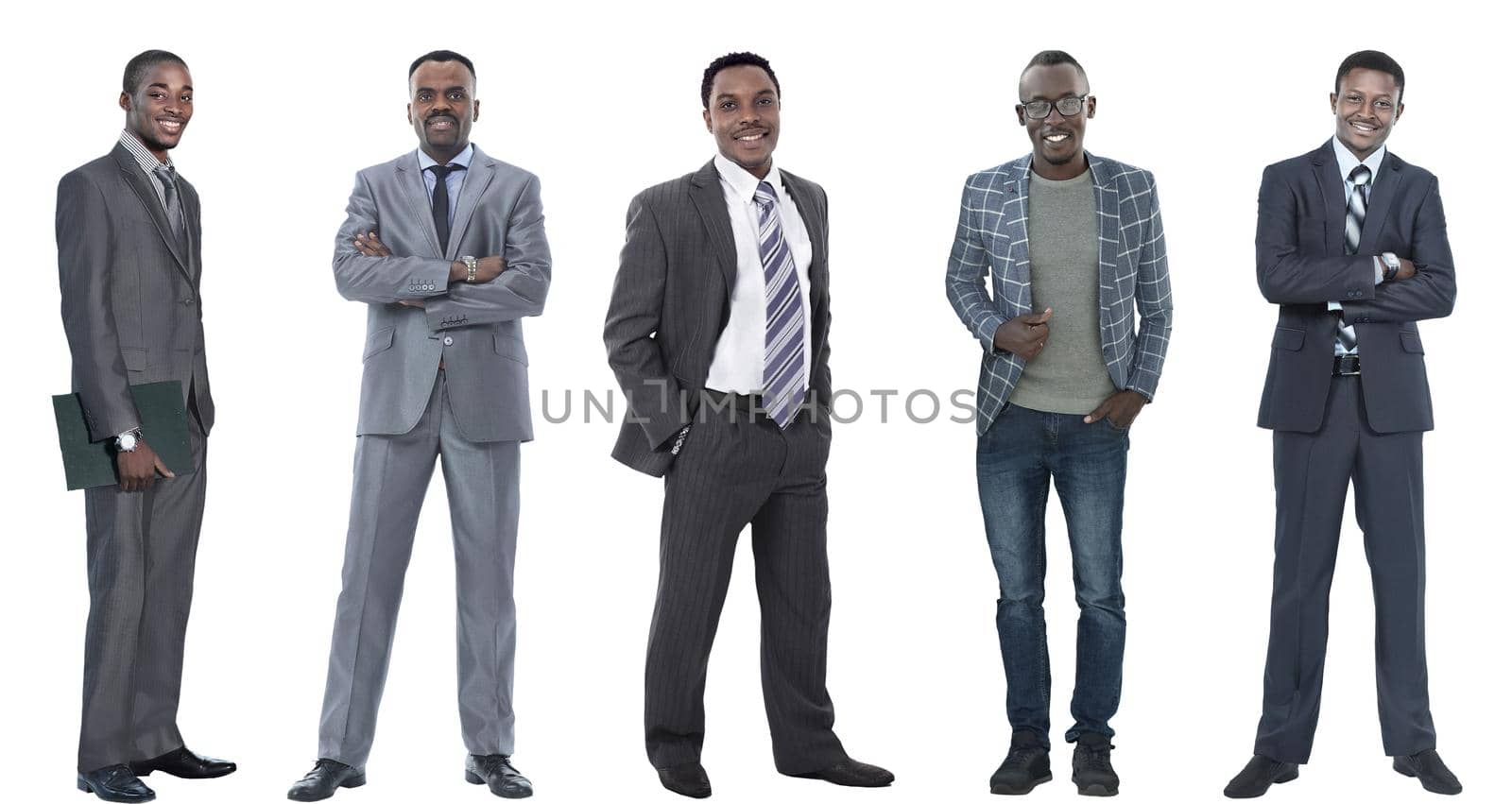 in full growth.international group of successful business people. isolated on white background .