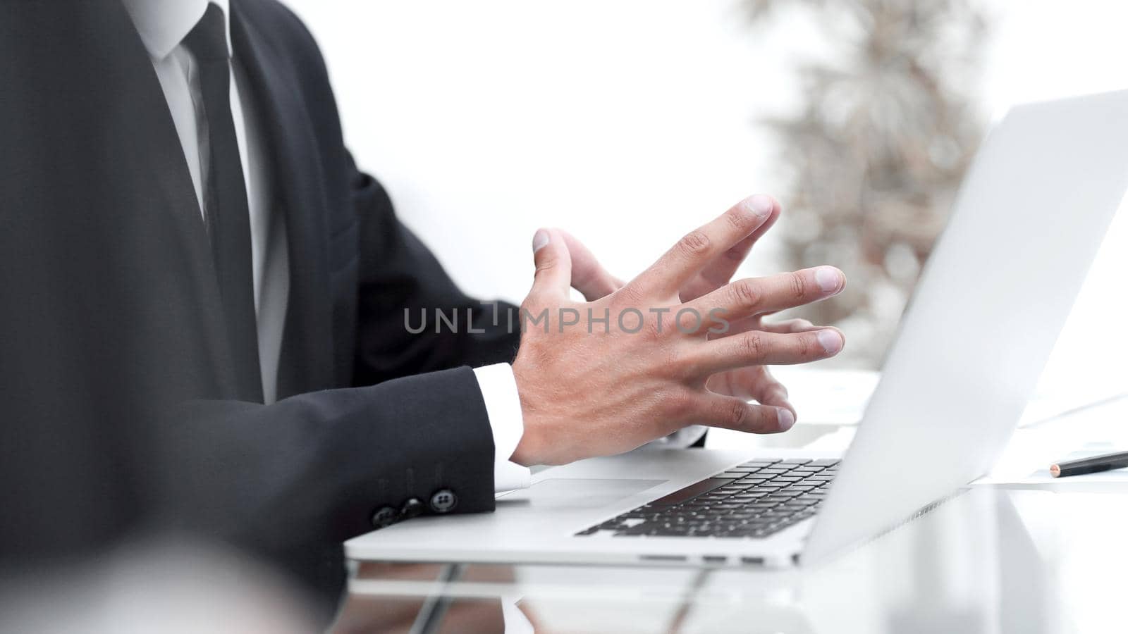 closeup.businessman looking at the laptop screen.business concept