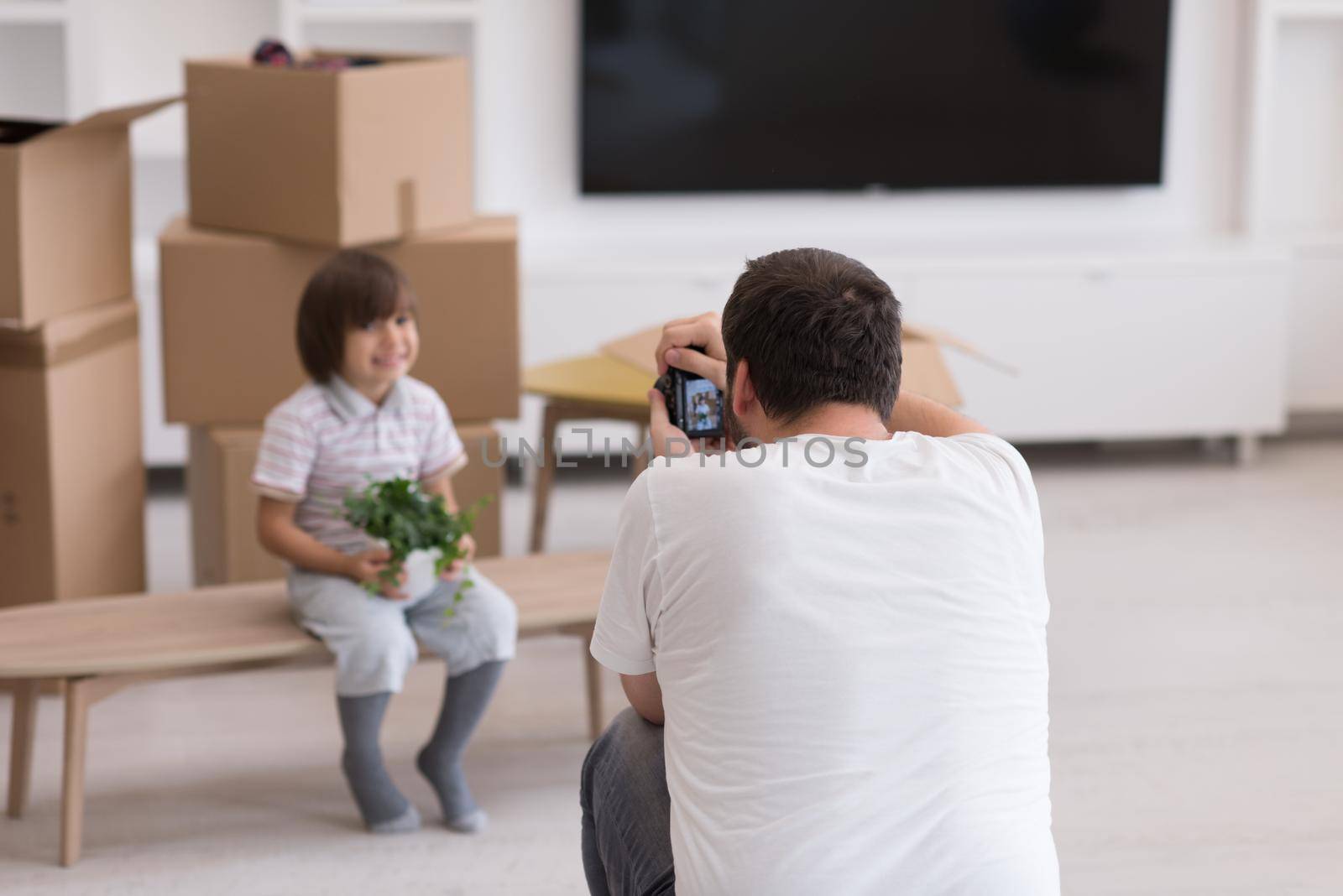 Photoshooting with kid model at studio as new modern home