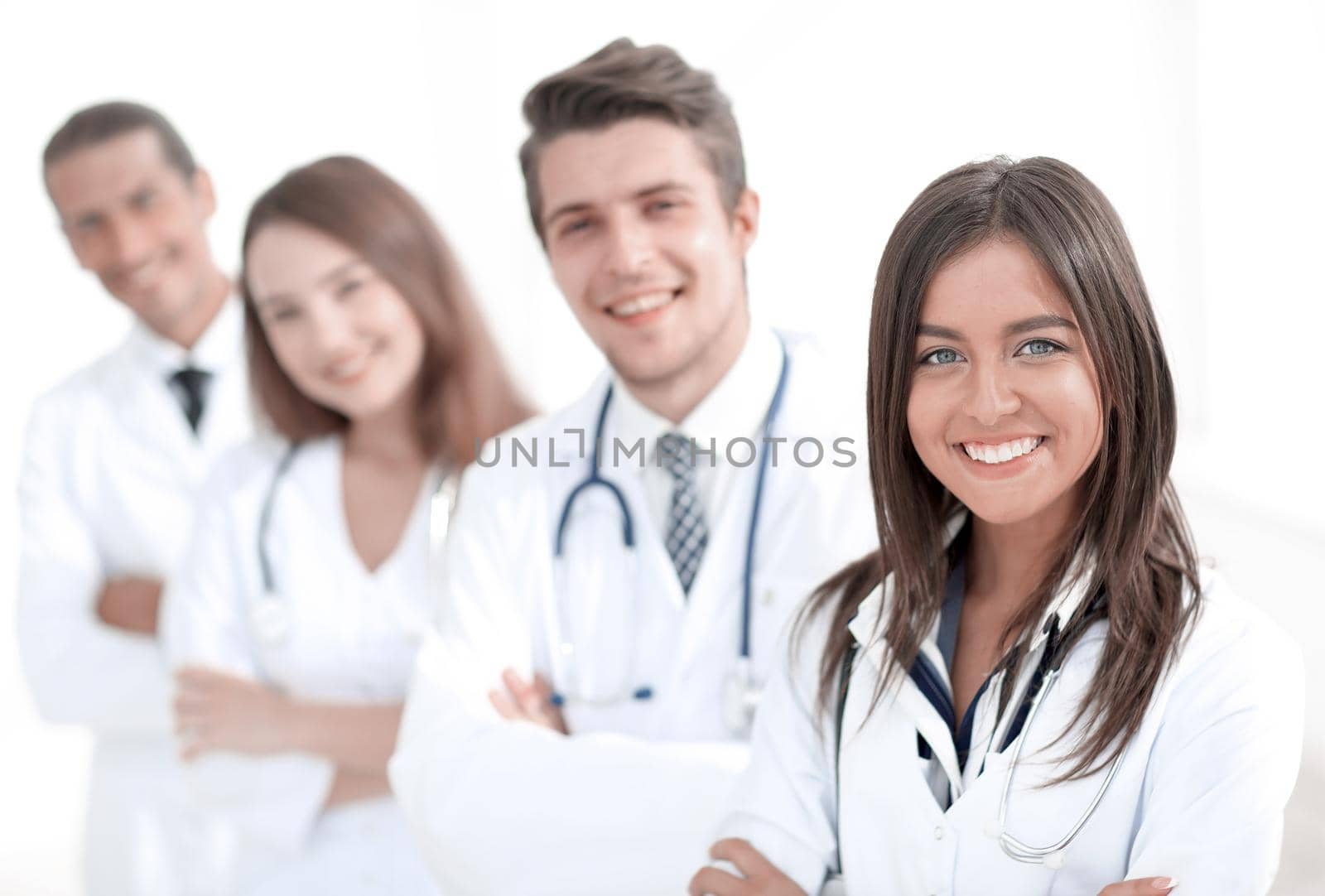 female doctor with group of happy successful colleagues.photo with copy space