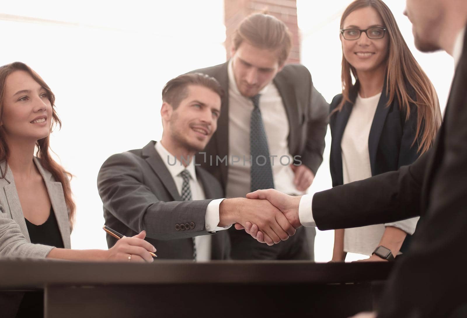 Business colleagues sitting at a table during a meeting