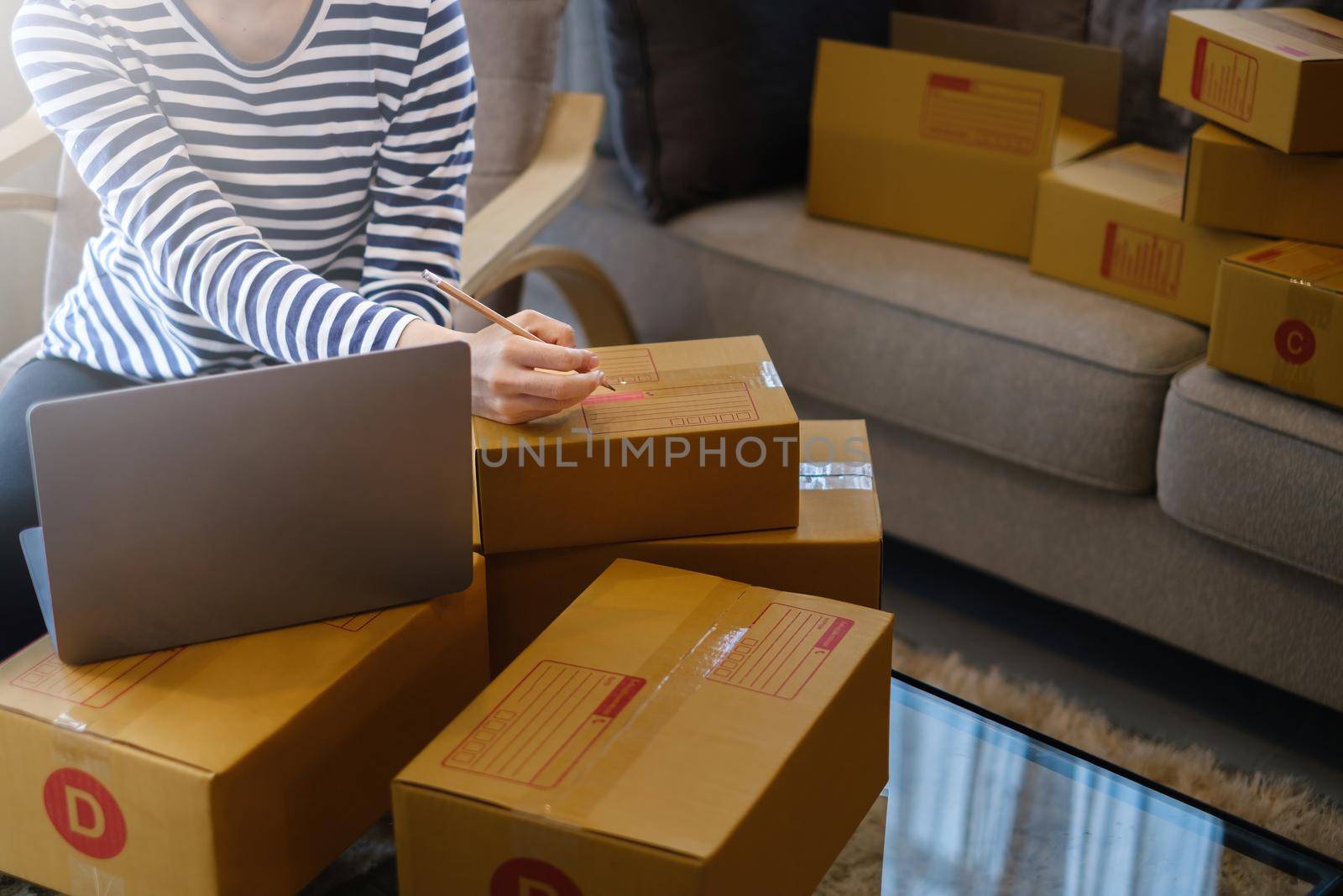 Asian small business owner working at home office. Business retail market and online sell marketing delivery, SME e-commerce concept by itchaznong