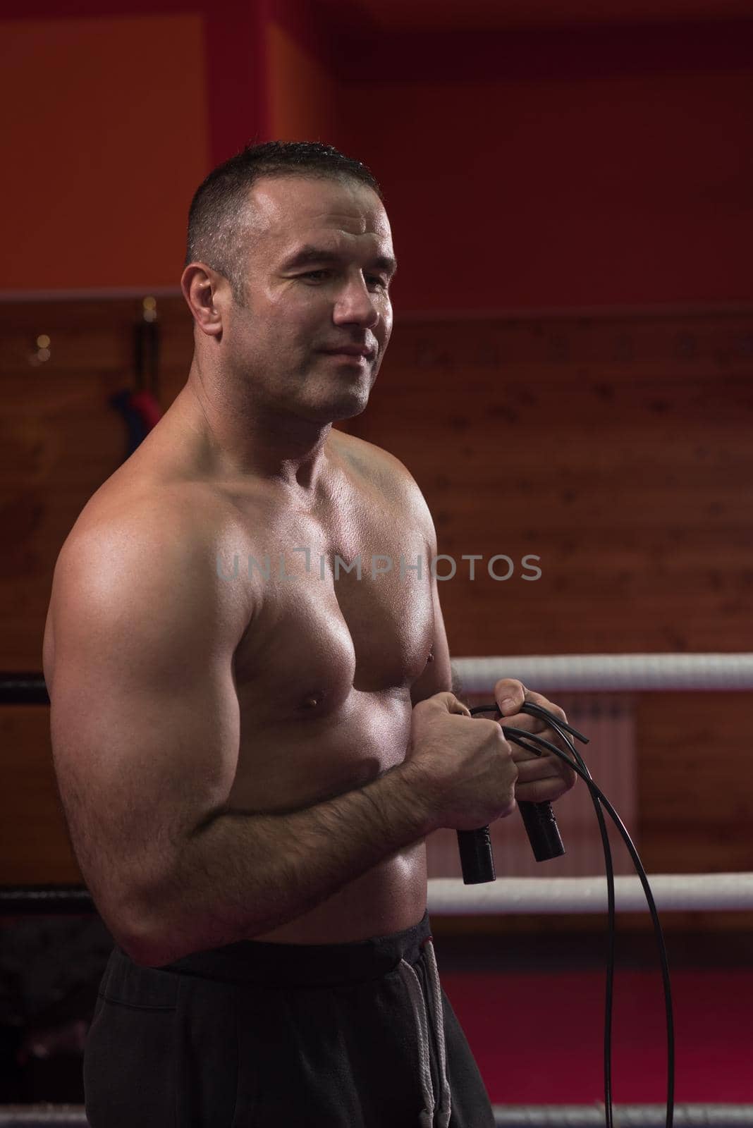 portrait of muscular professional kickboxer by dotshock